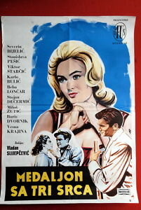 Медальон с тремя сердечками (1961) постер